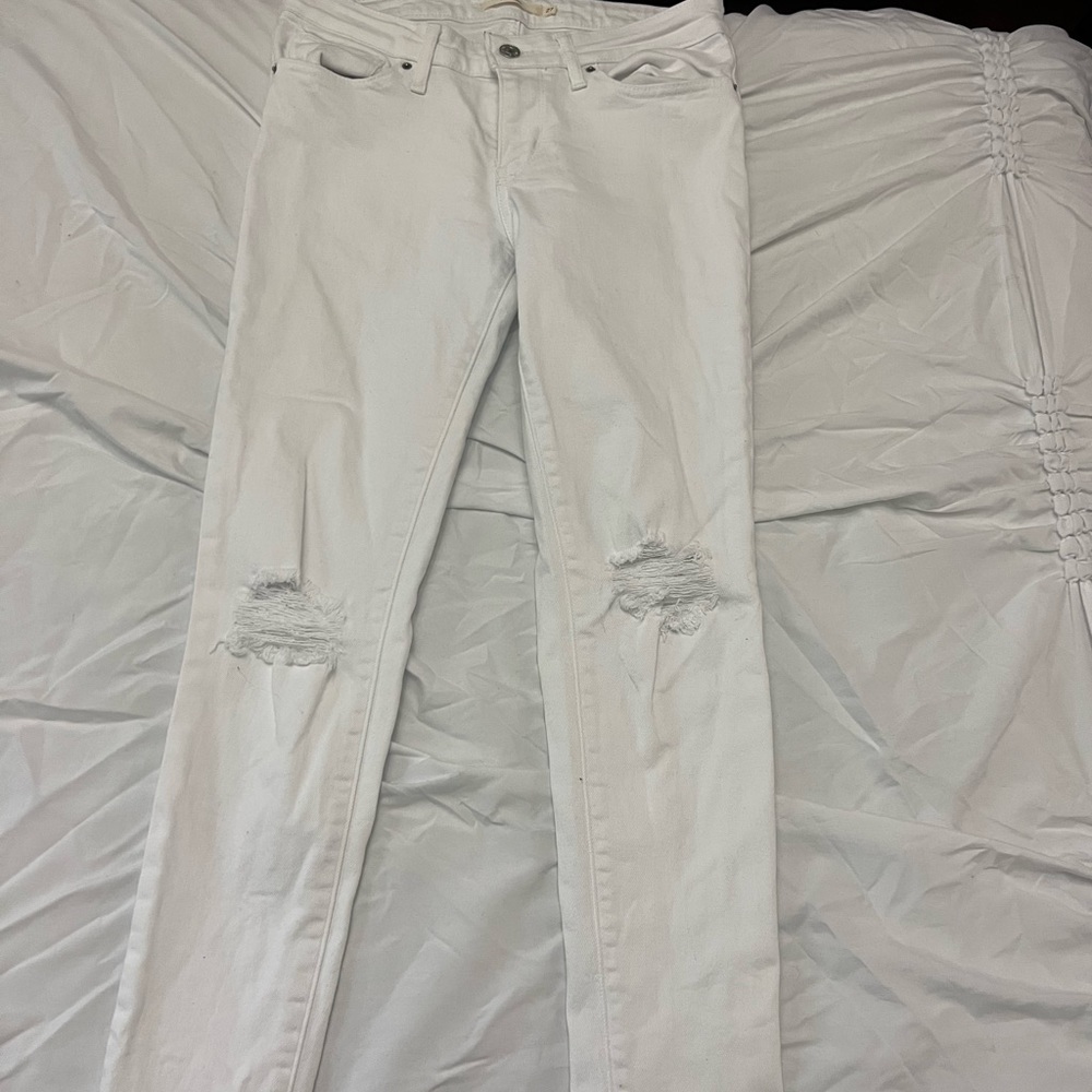 i have to many pairs of levi’s. white is the color, size 27